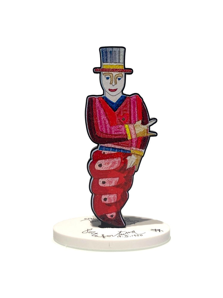 Portafortuna di Francesco Musante, scultura in resina in edizione limitata con figura stilizzata simbolo di fortuna e positività.