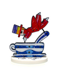 Tuffo nel caffè di Francesco Musante, scultura in resina in edizione limitata con personaggio che si tuffa in una tazzina di caffè.