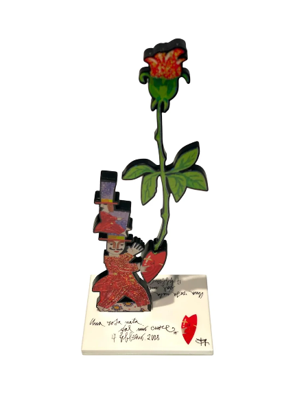 Una rosa nata dal mio cuore di Francesco Musante, scultura in resina in edizione limitata con figura femminile, cuore rosso e rosa.